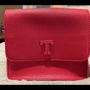 Brand new red handbag
